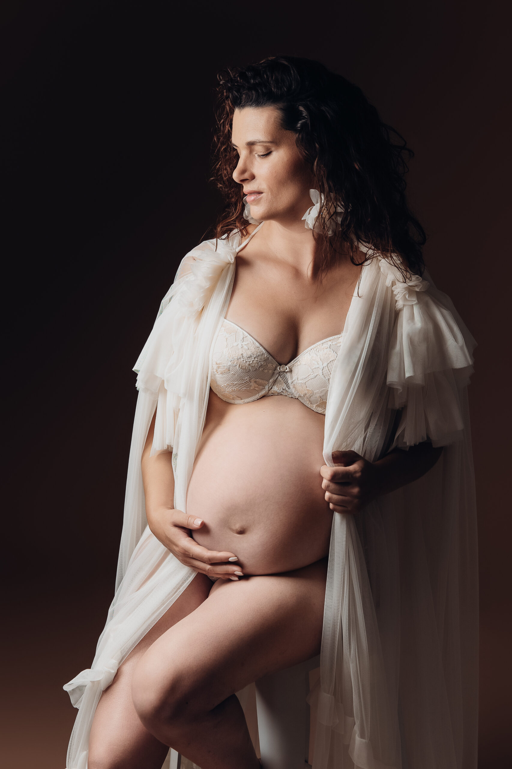 Séance photo grossesse studio en famille