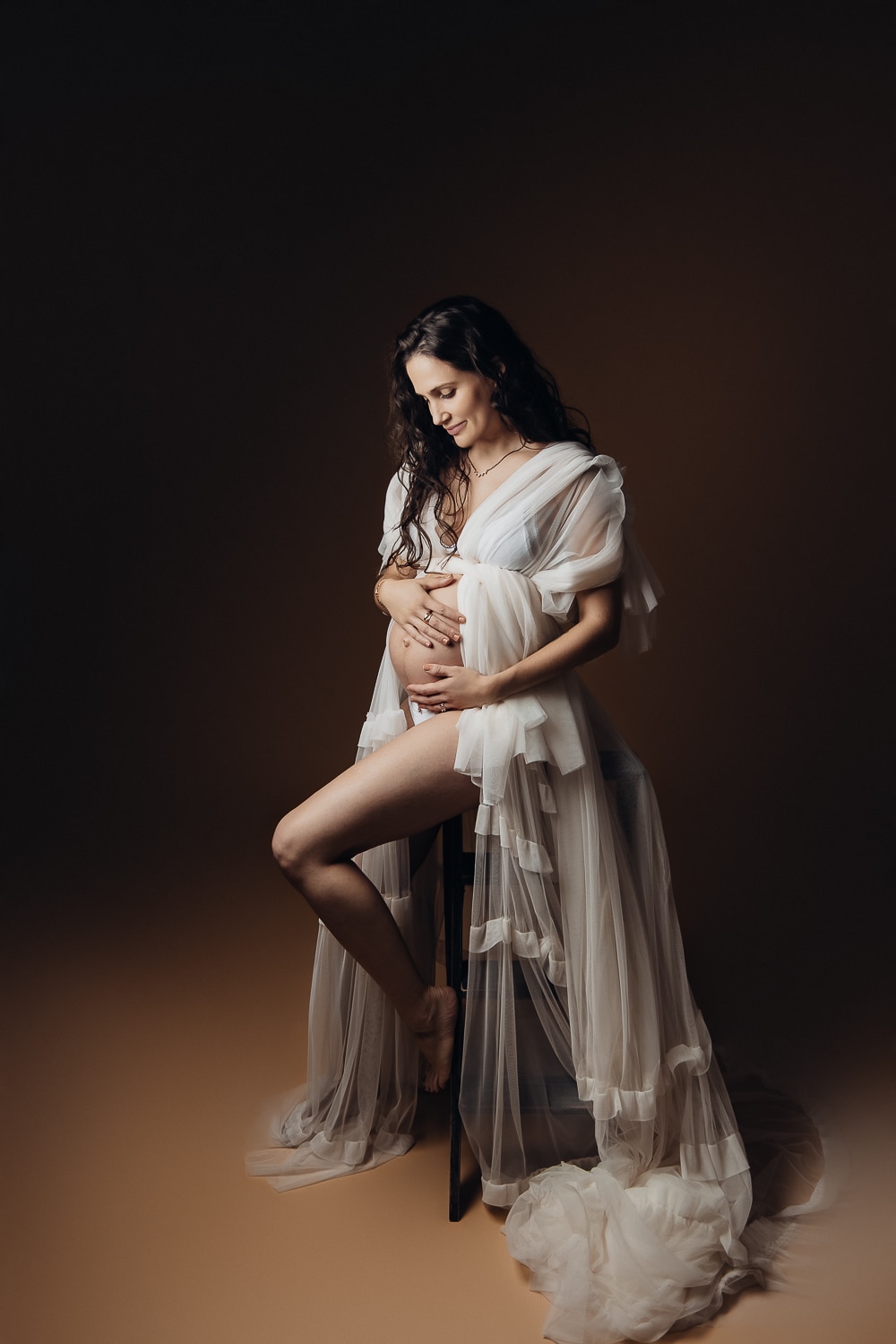 Est-ce que je dois poser nue pendant ma séance photo grossesse ?